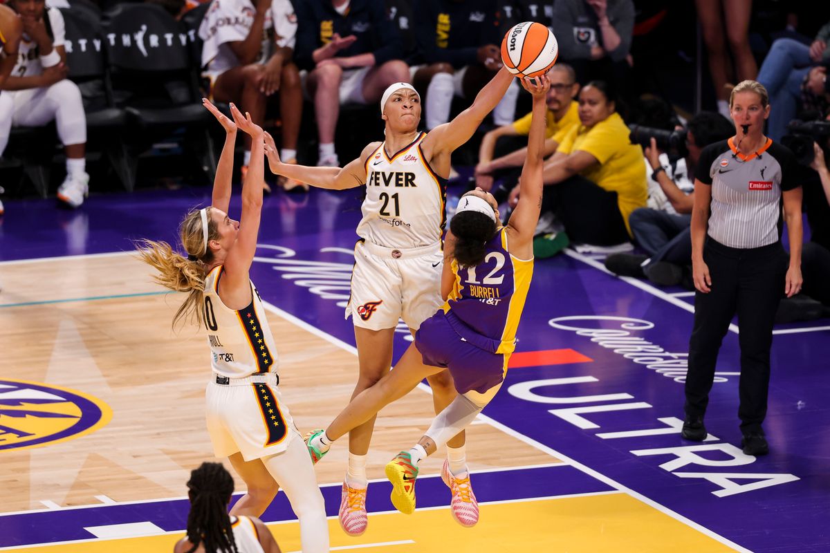 Makayla Timpson #21 of the Indiana Fever blocks the shot by Rae Burrell #12 of the Los Angeles Sparks during a WNBA game, Wednesday July 8, 2026 in Los Angeles, Calif. Makayla Timpson #21 of the Indiana Fever blocks the shot by Rae Burrell #12 of the Los Angeles Sparks during a WNBA game, Wednesday July 8, 2026 in Los Angeles, Calif.