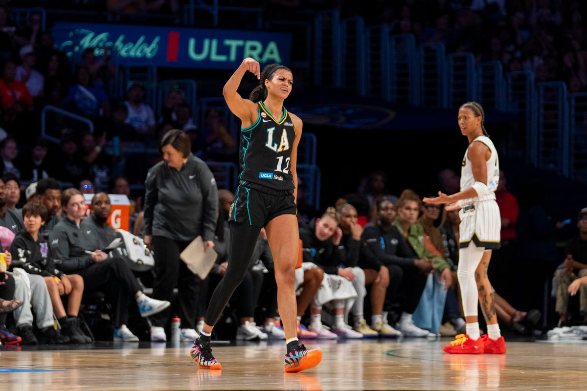 Los Angeles Sparks forward Rae Burrell (12) celebrates after drawing a foul on a three pointer and scoring the three during a WNBA game against the Chicago Sky, Friday July 10th, 2026 in Los Angeles, California. Los Angeles Sparks forward Rae Burrell (12) celebrates after drawing a foul on a three pointer and scoring the three during a WNBA game against the Chicago Sky, Friday July 10th, 2026 in Los Angeles, California.