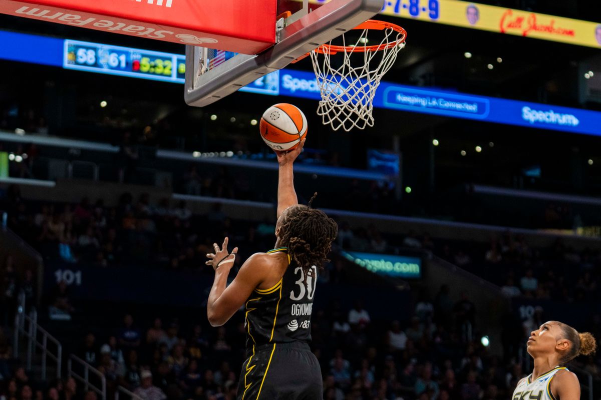 Los Angeles Sparks forward Nneka Ogwumike (30) scores a reverse layup during a WNBA game against the Chicago Sky, Friday July 10th, 2026 in Los Angeles, California. Los Angeles Sparks forward Nneka Ogwumike (30) scores a reverse layup during a WNBA game against the Chicago Sky, Friday July 10th, 2026 in Los Angeles, California.