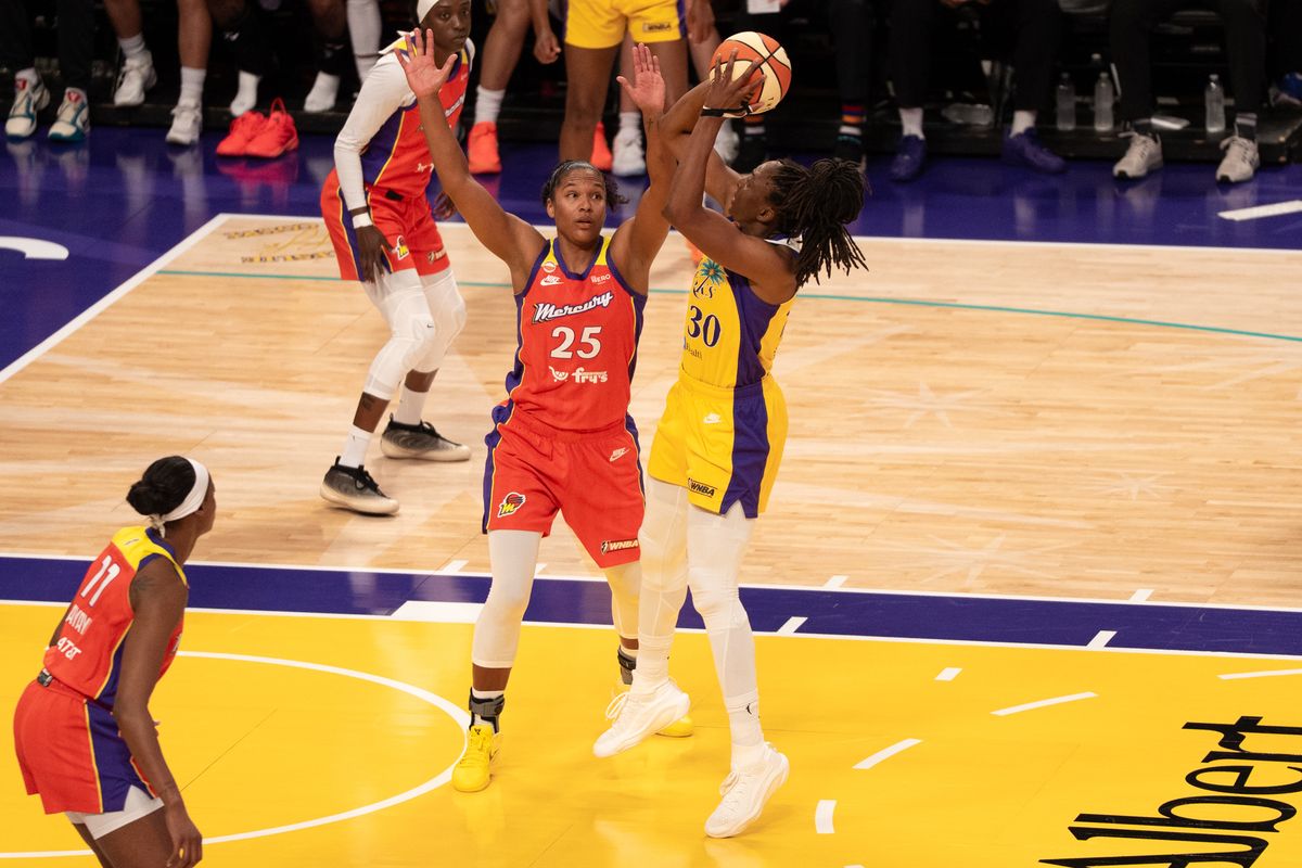 Los Angeles Sparks Forward Nneka Ogwumike (30) drives middle and scores on a pull up jumper during a WNBA game against the Phoenix Mercury, Wednesday July 22nd, 2026 in Los Angeles, California.