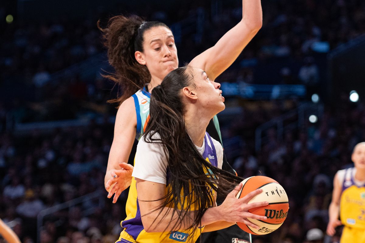 Los Angeles Sparks forward Dearica Hamby (5) goes under the rim during a match between New York Liberty and Los Angeles Sparks on Tuesday, July 28, 2026 at Crypto.com Arena