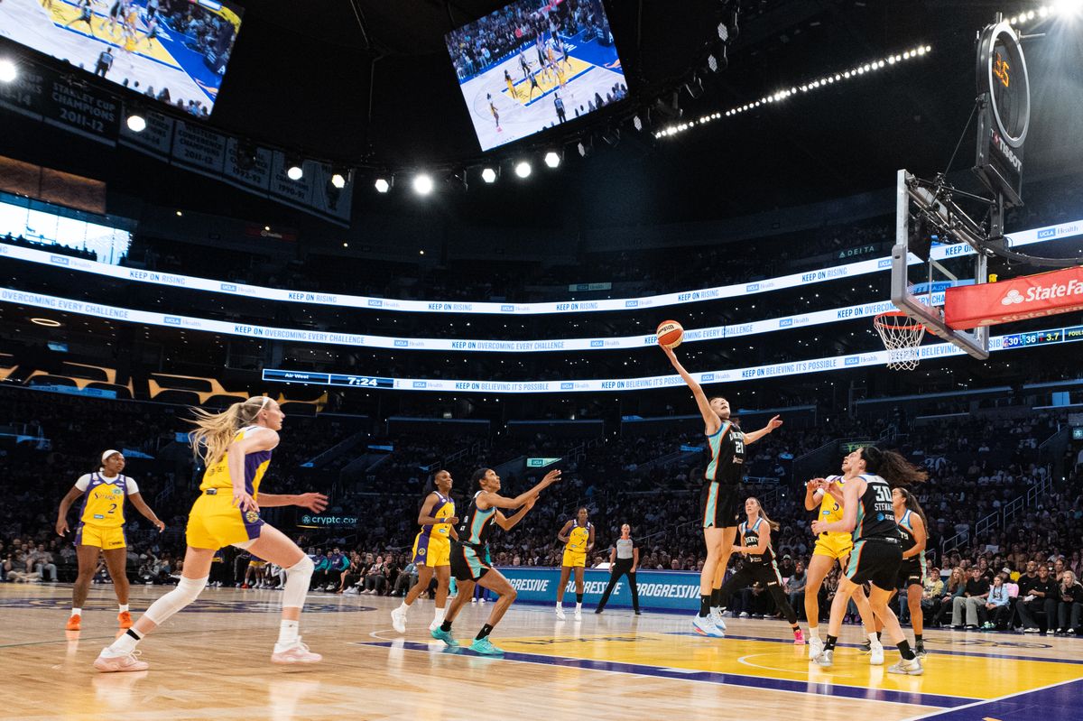 New York Liberty center Han Xu (21) makes a rebound during a match between New York Liberty and Los Angeles Sparks on Tuesday, July 28, 2026 at Crypto.com Arena