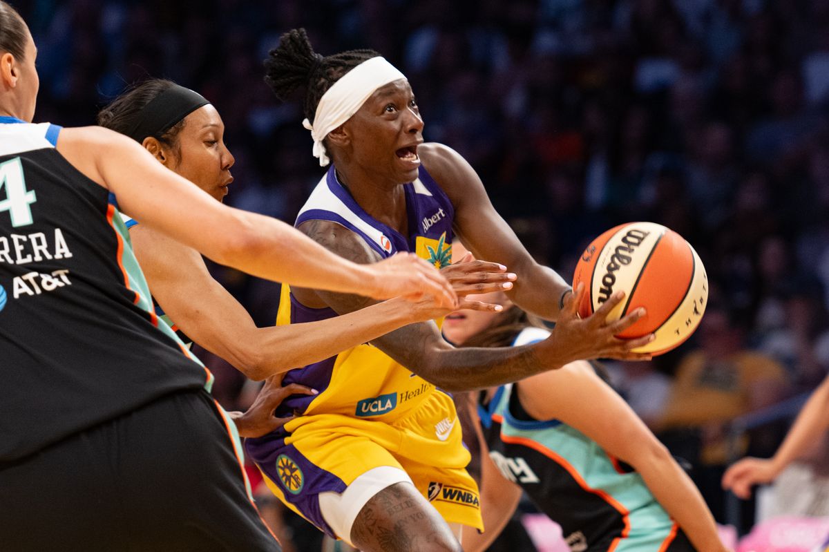 Los Angeles Sparks guard Tonie Morgan (1) drives to the basket against several defenders during a match between New York Liberty and Los Angeles Sparks on Tuesday, July 28, 2026 at Crypto.com Arena