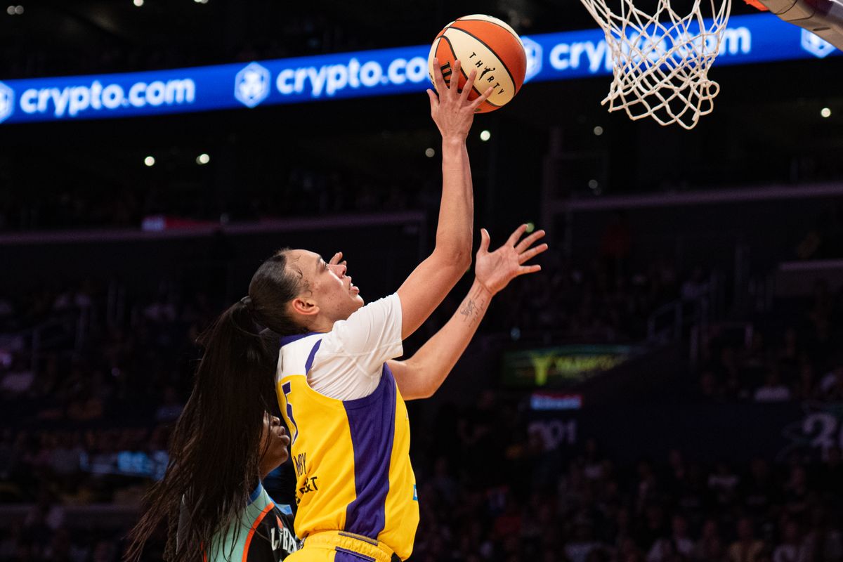 Los Angeles Sparks forward Dearica Hamby (5) scores under the rim during a match between New York Liberty and Los Angeles Sparks on Tuesday, July 28, 2026 at Crypto.com Arena