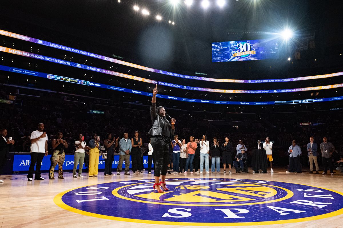 Former LA Sparks player DeLisha Milton-Jones speaks during his jersey retirement ceremony at half time during a match between New York Liberty and Los Angeles Sparks on Tuesday, July 28, 2026 at Crypto.com Arena