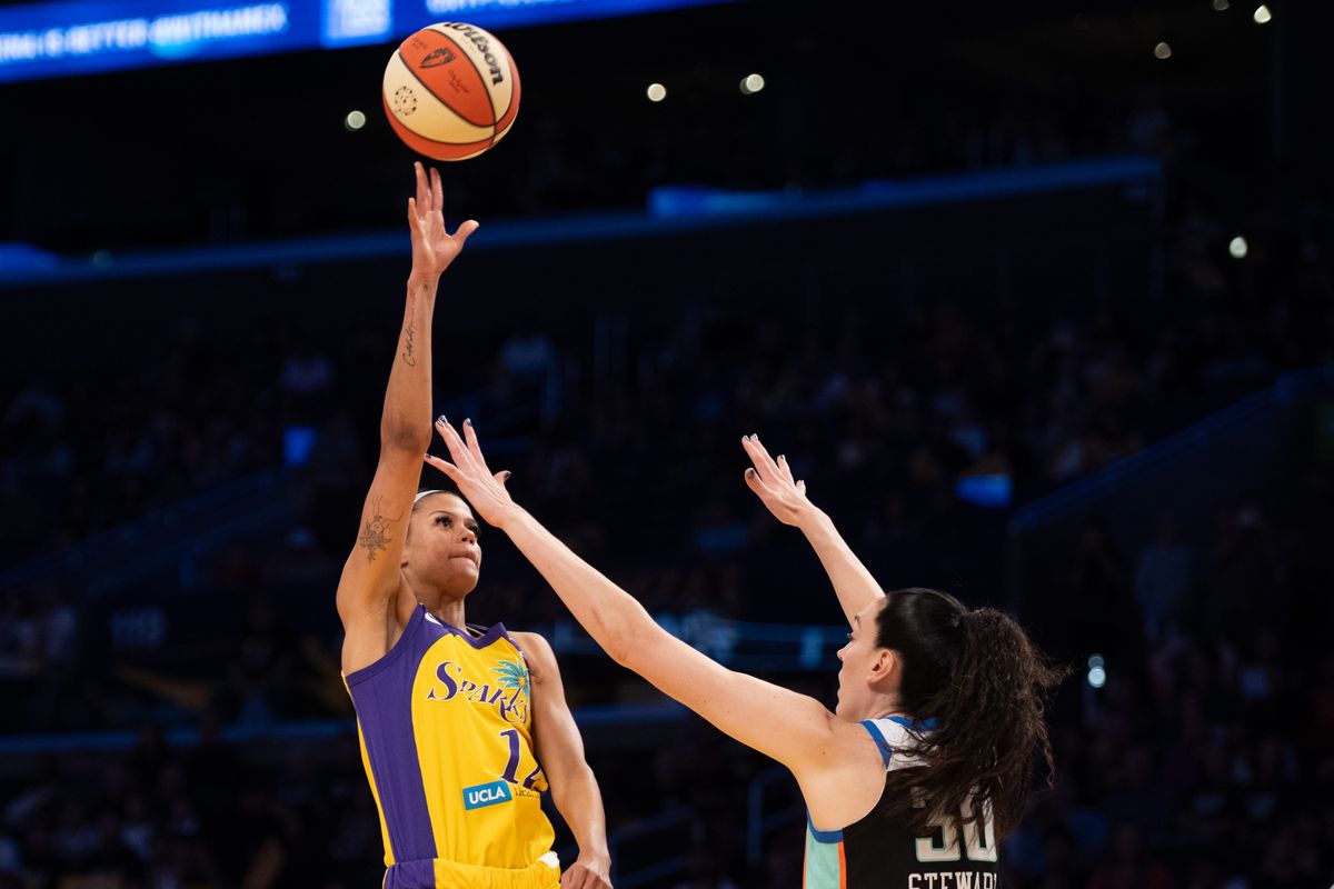 Los Angeles Sparks guard Rae Burrell (12) takes a hook shot during a match between New York Liberty and Los Angeles Sparks on Tuesday, July 28, 2026 at Crypto.com Arena