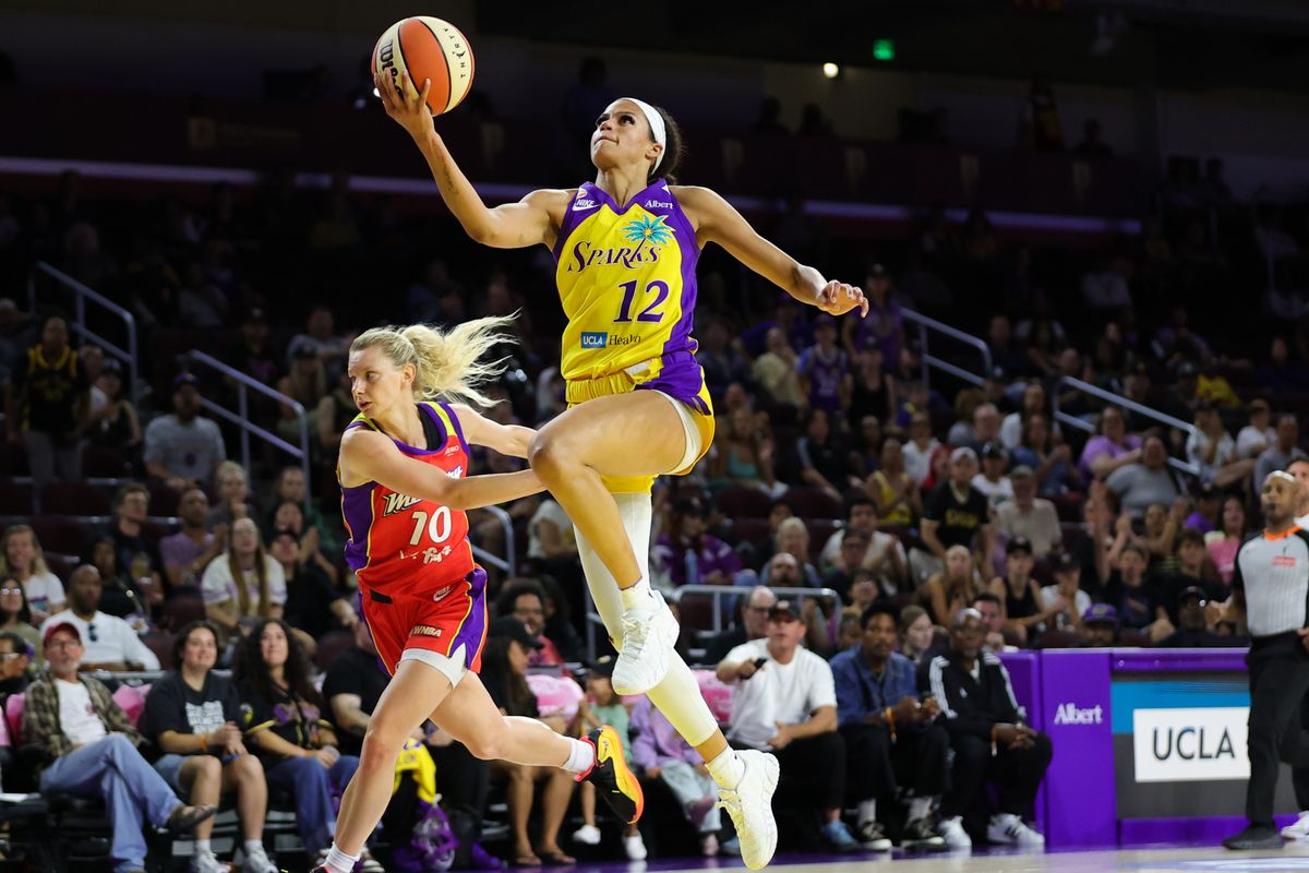 Los Angeles Sparks guard/forward Rae Burrell (12) attempts a lay up during a WNBA basketball game against the Phoenix Mercury on August 11th, 2026 in Los Angeles, CA. Los Angeles Sparks guard/forward Rae Burrell (12) attempts a lay up during a WNBA basketball game against the Phoenix Mercury on August 11th, 2026 in Los Angeles, CA.