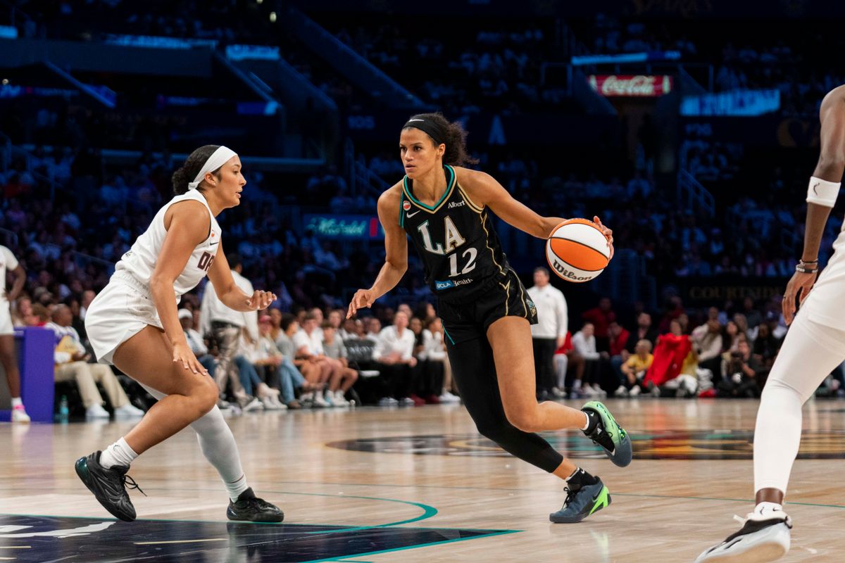 Los Angeles Sparks forward Rae Burrell (12) tries to drive past the defense during a WNBA game against the Atlanta Dream, Thursday August 20th, 2026 in Los Angeles, California. Los Angeles Sparks forward Rae Burrell (12) tries to drive past the defense during a WNBA game against the Atlanta Dream, Thursday August 20th, 2026 in Los Angeles, California.
