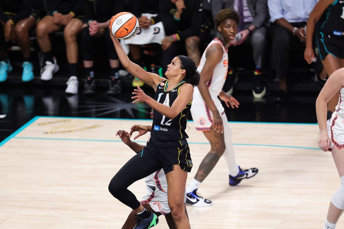 Los Angeles Sparks forward Rae Burrell (12) shoots a lay up during a WNBA game against the Connecticut Sun, Saturday August 22nd, 2026 in Los Angeles, California. Los Angeles Sparks forward Rae Burrell (12) shoots a lay up during a WNBA game against the Connecticut Sun, Saturday August 22nd, 2026 in Los Angeles, California.