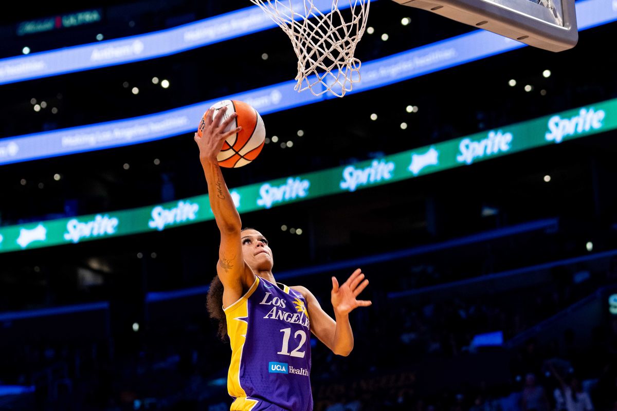 LA Sparks guard Rae Burrell (12) takes a lay-up at a WNBA basketball game against the Washington Mystics, Friday August 28th, 2026 in Los Angeles, California. LA Sparks guard Rae Burrell (12) takes a lay-up at a WNBA basketball game against the Washington Mystics, Friday August 28th, 2026 in Los Angeles, California.