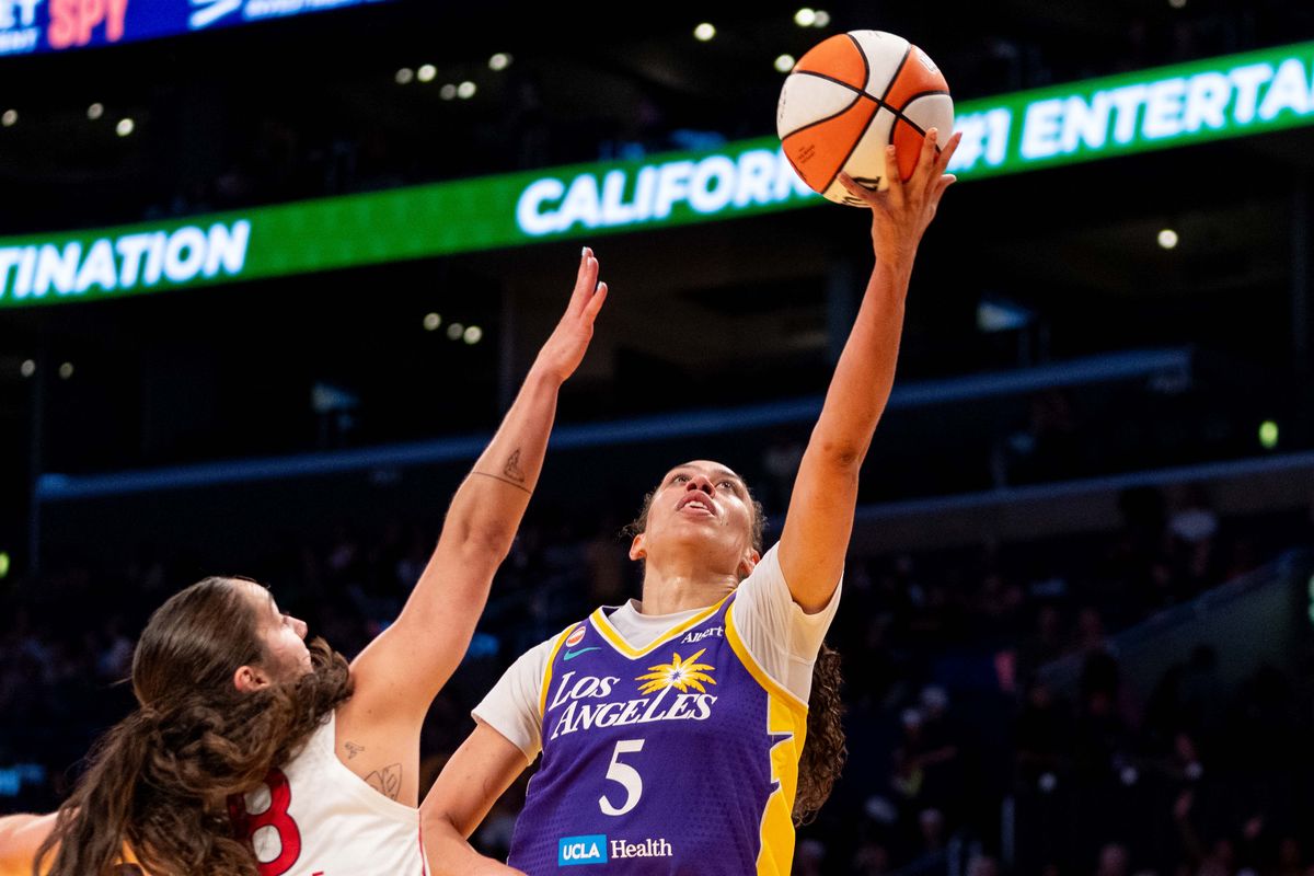 LA Sparks forward Dearica Hamby (5) attacks the basket at a WNBA basketball game against the Washington Mystics, Friday August 28th, 2026 in Los Angeles, California. LA Sparks forward Dearica Hamby (5) attacks the basket at a WNBA basketball game against the Washington Mystics, Friday August 28th, 2026 in Los Angeles, California.