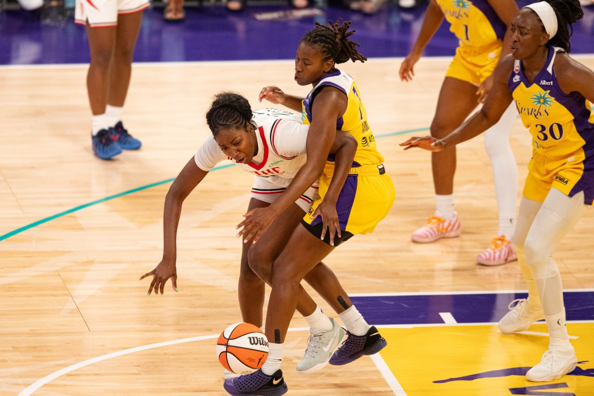 Los Angeles Sparks guard Ariel Atkins (7) defends the paint during an NBA match between Portland Fire and Los Angeles Sparks on Sunday, September 20, 2026 at Crypto.com Arena in Los Angeles, California.
