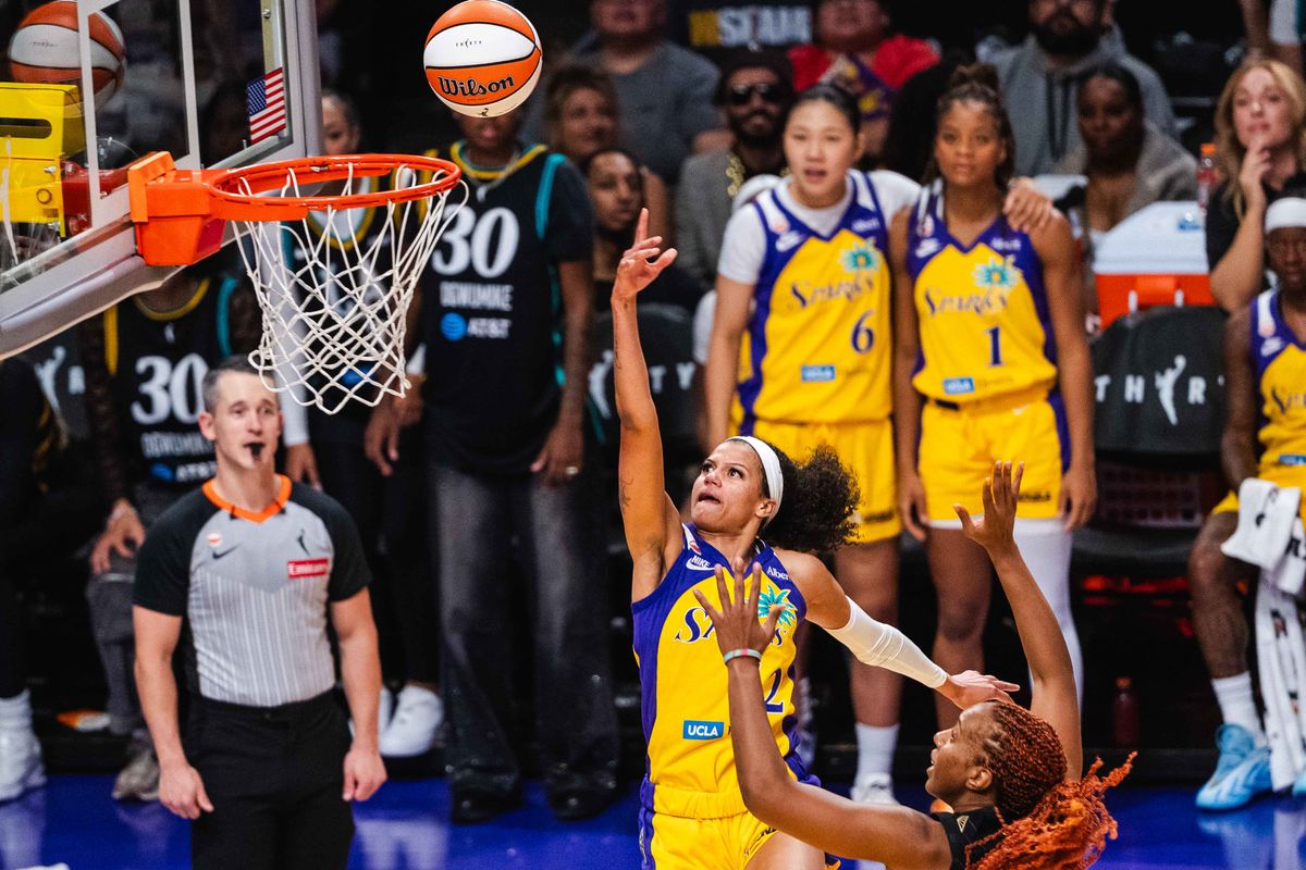 LA Sparks guard Rae Burrell (12) takes a lay-up during a WNBA basketball game against the Golden State Valkyries, Thursday September 24th, 2026 in Los Angeles, California. LA Sparks guard Rae Burrell (12) takes a lay-up during a WNBA basketball game against the Golden State Valkyries, Thursday September 24th, 2026 in Los Angeles, California.