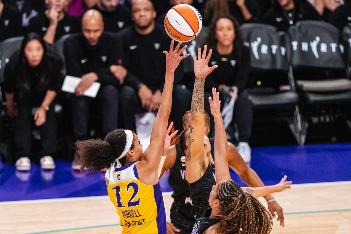 LA Sparks guard Rae Burrell (12) takes a floater during a WNBA basketball game against the Golden State Valkyries, Thursday September 24th, 2026 in Los Angeles, California. LA Sparks guard Rae Burrell (12) takes a floater during a WNBA basketball game against the Golden State Valkyries, Thursday September 24th, 2026 in Los Angeles, California.